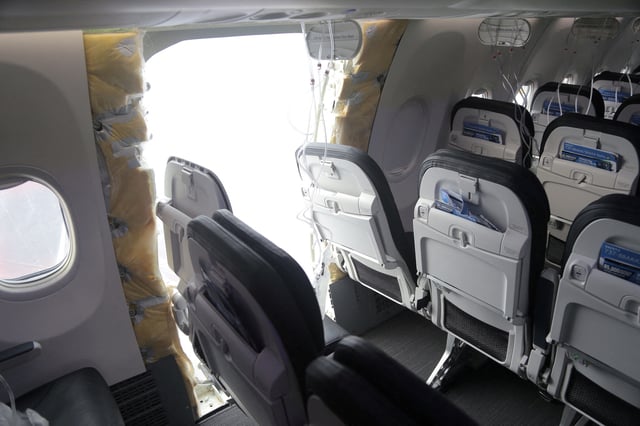 The fuselage plug area of Alaska Airlines Flight 1282 Boeing 737-9 MAX, which was forced to make an emergency landing with a gap in the fuselage, is seen during its investigation by the National Transportation Safety Board (NTSB) in Portland, Oregon, U.S. January 7, 2024.  NTSB/Handout via REUTERS/File Photo