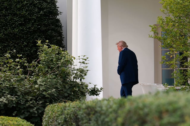 President Donald Trump walks out of the Oval Office before boarding Marine One on the South Lawn of the White House on June 20, 2025.