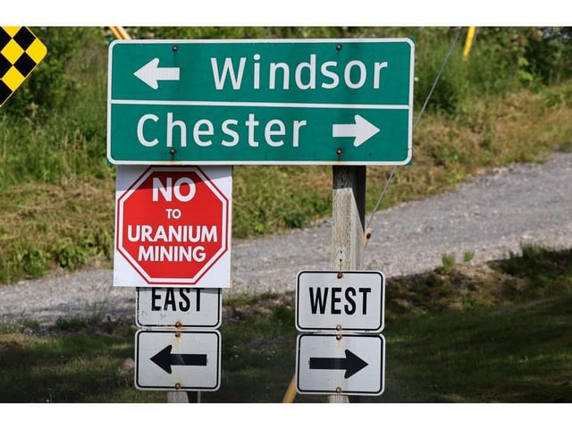  A sign opposing uranium mining is seen on Highway 14 near Falls Lake on Monday.