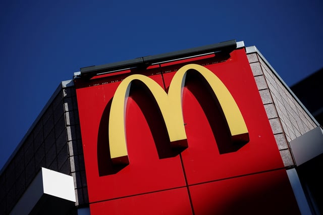 Signage outside a McDonald's restaurant in Washington, DC, U.S., November 25, 2024. REUTERS/Benoit Tessier/File Photo