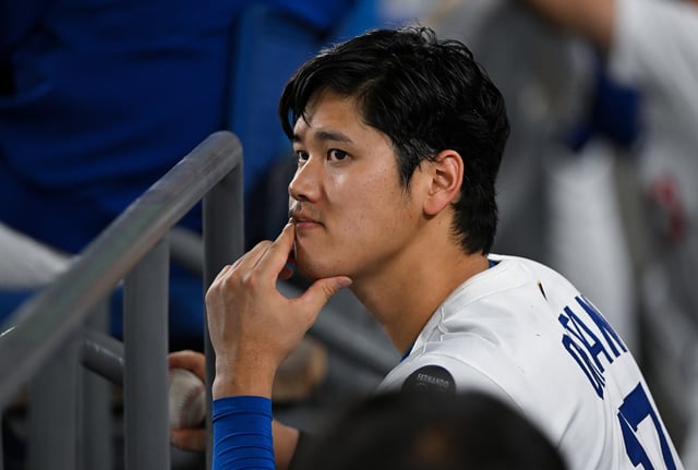 LOS ANGELES, CALIFORNIA - JUNE 20: Shohei Ohtani #17 of the Los Angeles Dodgers talks during the game against the Washington Nationals at Dodger Stadium on June 20, 2025 in Los Angeles, California. (Photo by Gene Wang/Getty Images)