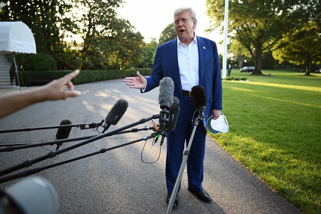 President Donald Trump speaks to the press before boarding Marine One from the South Lawn of the White House in Washington, DC on June 24, 2025, to attend the NATO's Heads of State and Government summit in The Hague. 