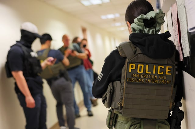 Federal agents patrol the halls of immigration court at the Jacob K. Javitz Federal Building on June 18, 2025 in New York City.