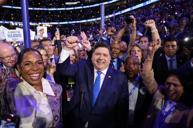 Gov. JB Pritzker announces the Illinois delegation ceremonial votes cast during the roll call for Vice President Kamala Harris and Minnesota Gov. Tim Walz at the United Center on Aug. 20, 2024, during the Democratic National Convention. (Brian Cassella/Chicago Tribune)