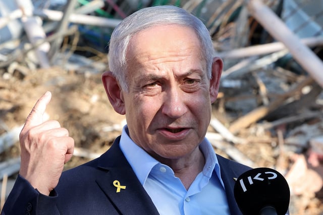 Israel's Prime Minister Benjamin Netanyahu gives a statement during a visit to the site of the Weizmann Institute of Science, which was hit by an Iranian missile barrage, in the central city of Rehovot, Israel June 20, 2025. JACK GUEZ/Pool via REUTERS/ File Photo