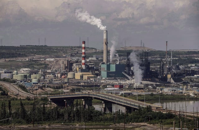 Suncor's base plant with upgraders in the oilsands in Fort McMurray Alta, on Monday June 13, 2017. THE CANADIAN PRESS/Jason Franson