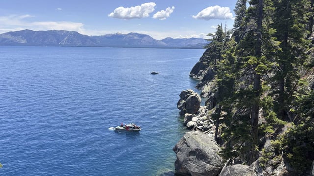 Authorities conduct searches along the shore at D.L. Bliss State Park after a weekend incident in which a boat capsized, killing several people, on Monday, June 23, 2025, in South Lake Tahoe.