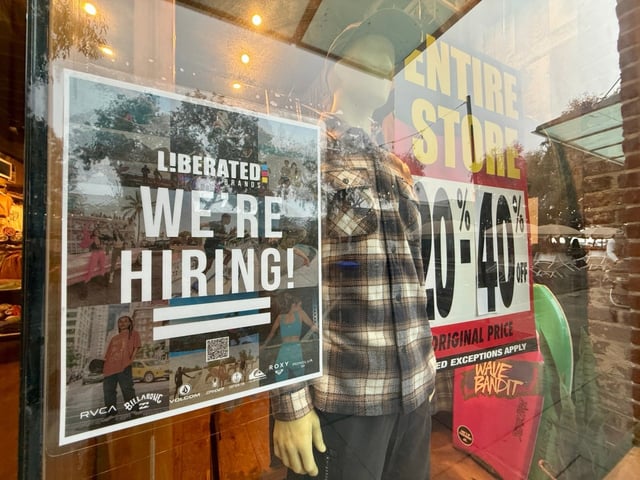 A help wanted in the window of the Quicksilver store on Forest Avenue in Laguna Beach, CA on Thursday, Feb. 6, 2025. The store is among 100 Liberated Brands retail locations being shuttered. Liberated Brands is the distributor of Billabong, Quiksilver and Volcom.  (Photo by Jeff Gritchen, Orange County Register/SCNG)