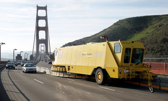 FILE: The zipper truck reconfiguring lanes on the Golden Gate Bridge in 2016.