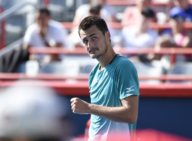 Aug 4, 2019; Montreal, Quebec, Canada; Bernard Tomic of Australia reacts after defeating Marc Polmans of Australia (not pictured) during the Rogers Cup tennis tournament at Stade IGA. Mandatory Credit: Eric Bolte-USA TODAY Sports/File Photo
