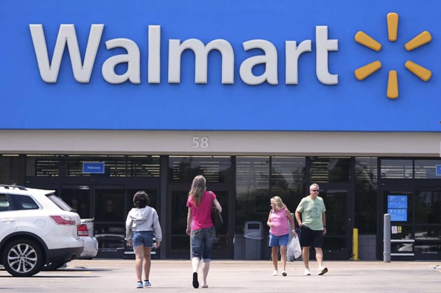 Shoppers outside a Walmart store on June 23. Walmart plans to permanently lay off 381 employees across four locations on West California Avenue in Sunnyvale. The job cuts are part of a broader restructuring effort affecting corporate and tech roles nationwide.