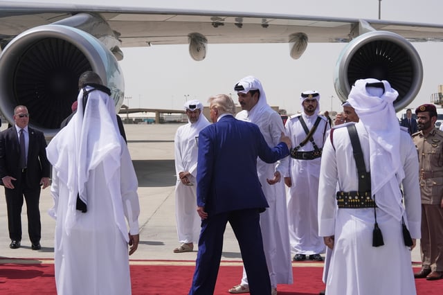 Qatar&#39;s Emir Sheikh Tamim bin Hamad Al Thani bids farewell to President Donald Trump at Al Udeid Air Base, Thursday, May 15, 2025, in Doha, Qatar.