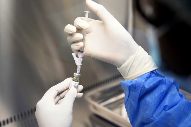 A pharmacist holds a vial of lenacapavir, the new HIV prevention injectable drug, at the Desmond Tutu Health Foundation's Masiphumelele Research Site, in Cape Town, South Africa, Tuesday, July 23, 2024. 