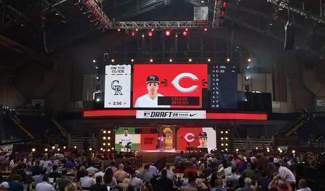 Jul 14, 2024; Ft. Worth, TX, USA;  The Cincinnati Reds select Chase Burns with the second pick during the first round of the MLB Draft at Cowtown Coliseum. Mandatory Credit: Kevin Jairaj-USA TODAY Sports/File Photo