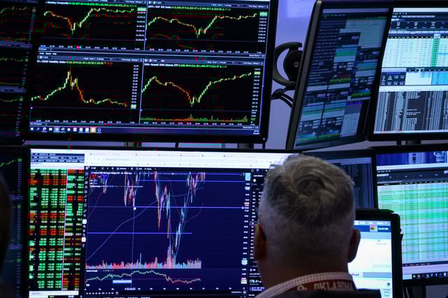 A trader works on the floor at the New York Stock Exchange (NYSE) in New York City, U.S., June 23, 2025. REUTERS/Brendan McDermid