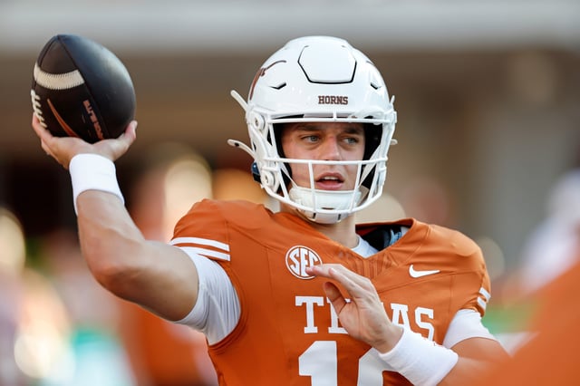 Arch Manning #16 of the Texas Longhorns warms up before the game against the against the Louisiana Monroe Warhawks at Darrell K Royal-Texas Memorial Stadium on September 21, 2024 in Austin, Texas.
