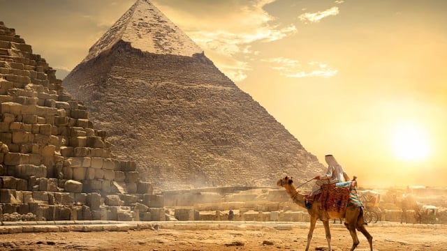 Man riding a camel in egypt