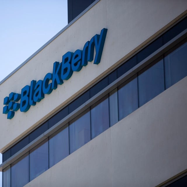 The Blackberry logo located in the front of the company's B building in Waterloo, Ont. on Tuesday, May 29, 2018. BlackBerry Ltd. says it's taking action to streamline costs, including cutting jobs, as part of the ongoing process to separate two of its business divisions. THE CANADIAN PRESS/Andrew Ryan