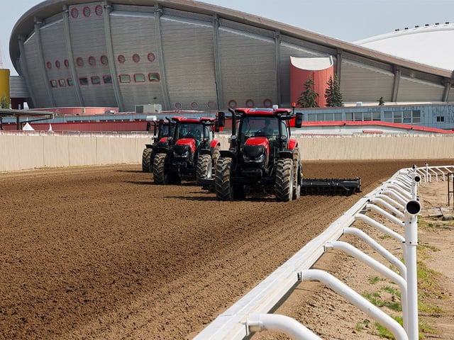  Tractors harrow the Calgary Stampede race track on Tuesday, June 24, 2025.