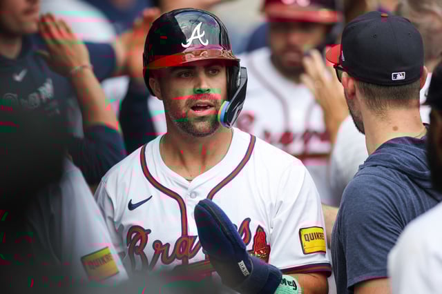 Sep 30, 2024; Atlanta, Georgia, USA; Atlanta Braves left fielder Whit Merrifield (15) celebrates with teammates after scoring a run against the New York Mets in the eighth inning at Truist Park. Mandatory Credit: Brett Davis-Imagn Images/File Photo