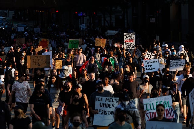 Activists march in the Loop after protests took place across the country following recent ICE raids on immigrant communities on June 10, 2025. (Armando L. Sanchez/Chicago Tribune)