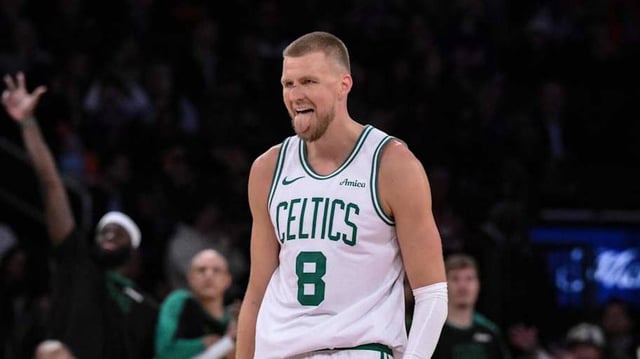 Boston Celtics center Kristaps Porzingis (8) reacts during the second half against the New York Knicks at Madison Square Garden.