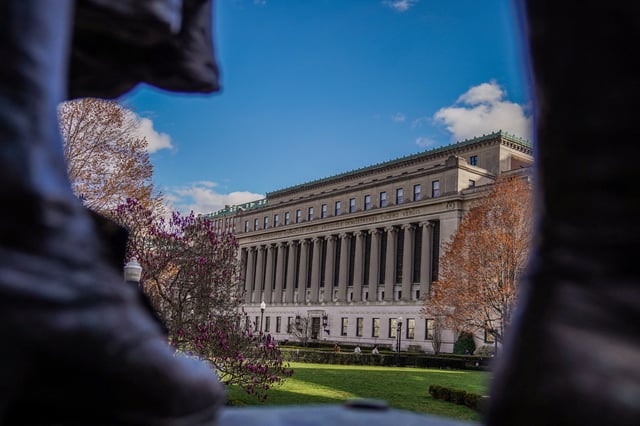 People walk on campus at Columbia University in New York City, U.S., April 8, 2025. REUTERS/Ryan Murphy/File Photo