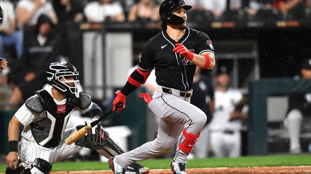 Jun 24, 2025; Chicago, Illinois, USA; Arizona Diamondbacks center fielder Alek Thomas (5) hits an RBI single during the seventh inning against the Chicago White Sox at Rate Field. Mandatory Credit: Patrick Gorski-Imagn Images