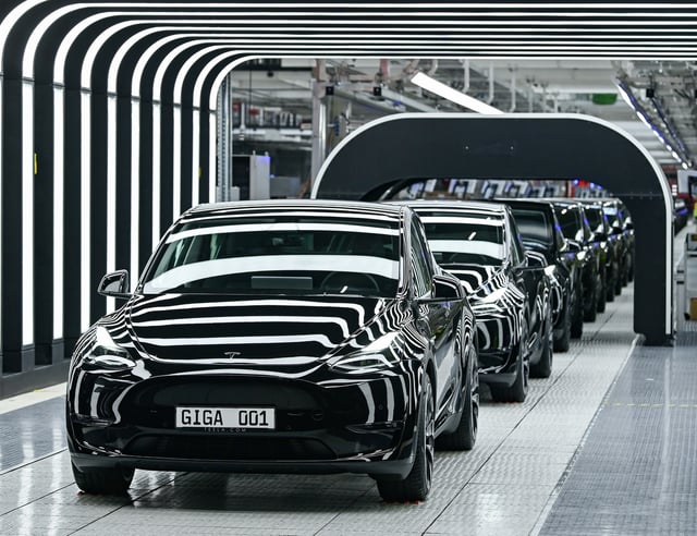 Model Y cars are pictured during the opening ceremony of the new Tesla Gigafactory for electric cars in Gruenheide, Germany, March 22, 2022. Patrick Pleul/Pool via REUTERS/File Photo