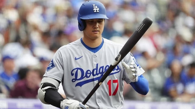 Jun 24, 2025; Denver, Colorado, USA; Los Angeles Dodgers designated hitter Shohei Ohtani (17) during the first inning against the Colorado Rockies at Coors Field. Mandatory Credit: Ron Chenoy-Imagn Images