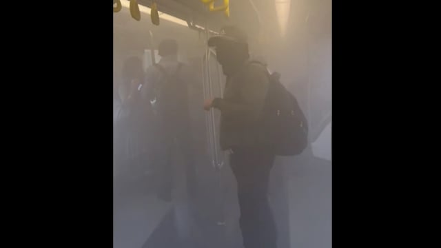 Most people inside the metro coach covered their faces with handkerchiefs and masks to avoid inhaling smoke.