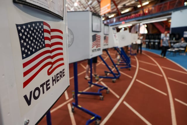NEW YORK, NEW YORK - JUNE 24: People vote in the mayoral primary election at the Park Slope Armory YMCA on June 24, 2025 in the Brooklyn borough of New York City.