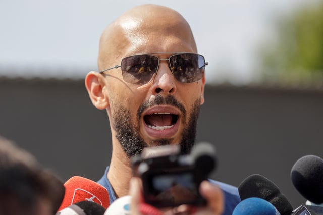 Andrew Tate delivers a press statement outside his house in Voluntari, Ilfov, Romania, August 4, 2023. Inquam Photos/George Calin via REUTERS/ File Photo