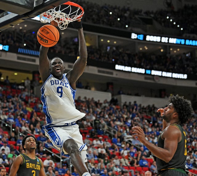 March 23: Duke's Khaman Maluach (9) dunks the ball during the second half against Baylor at Lenovo Center. Duke won the game, 89-66.
