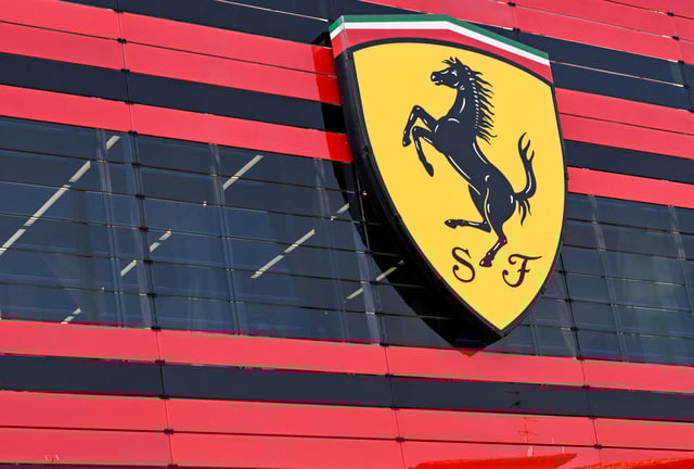 The logo of Ferrari is seen in the headquarters, in Maranello, Italy, June 15, 2022. Picture taken June 15, 2022. REUTERS/Flavio Lo Scalzo