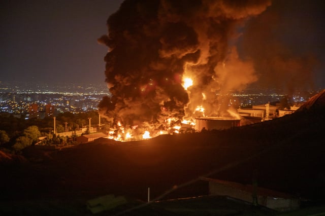 Fire and smoke rise into the sky after an Israeli attack on the Shahran oil depot on June 15, 2025 in Tehran, Iran. Iran&#39;s foreign minister said the country would respond decisively and proportionally to a wave of attacks that Israel launched beginning in the early hours of June 13. The attacks targeted multiple military, scientific and residential locations, as well as senior government officials.
