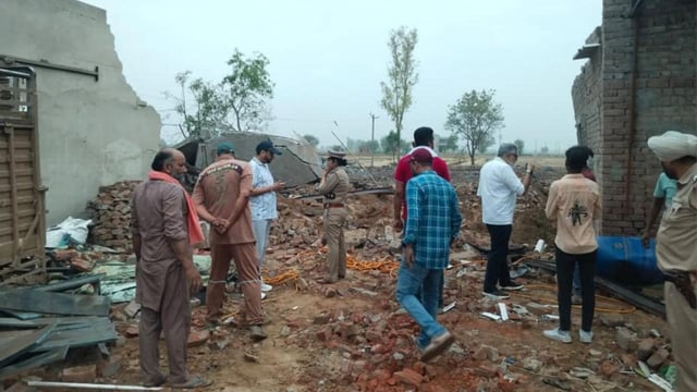 Investigators at the site of the explosion at Singhewala village in Punjab’s Muktsar district on May 30. The explosion left five people dead and 29 injured. (HT file photo)