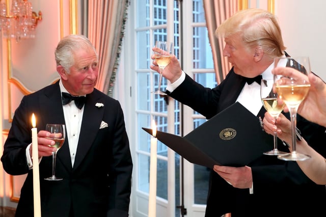 King Charles III and Donald Trump raise their glasses during a dinner at Winfield House, in London, during the President&#39;s first state visit to Britain, on June 4, 2019.