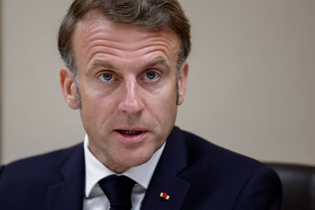 French President Emmanuel Macron flanked by French Presidency General Secretary Emmanuel Moulin and France's General Fabien Mandon attends a national security meeting on the crisis between Israel and Iran in the Jupiter room at the Elysee Palace in Paris, France, June 22, 2025. REUTERS/Benoit Tessier/Pool/ File Photo