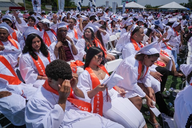 Graduates sit during the Paterson Public Schools graduation at Hinchliffe Stadium, Jun 23, 2025, Paterson, New Jersey.
