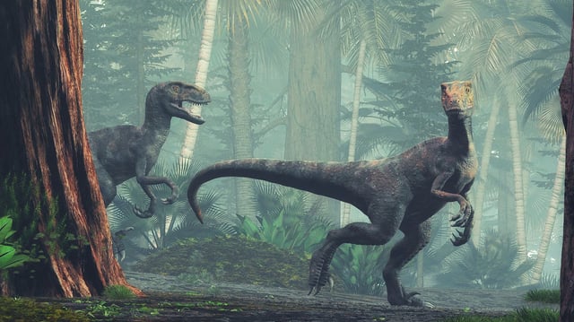 Velociraptor walking through the forest.