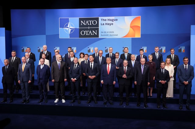 NATO Secretary General Mark Rutte and Dutch Prime Minister Dick Schoof pose for a family photo with NATO leaders during a NATO leaders summit in The Hague, Netherlands June 25, 2025. REUTERS/Claudia Greco