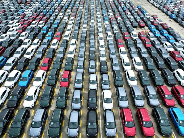 A large number of exported automobiles are ready for loading at the port of Lianyungang in Lianyungang City, Jiangsu Province, China on June 20, 2025.