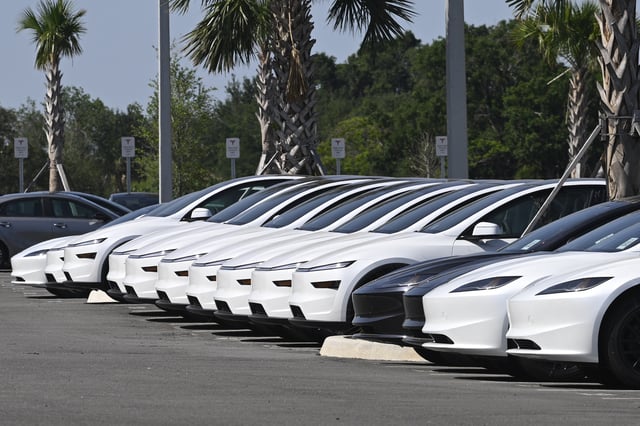 Tesla electric vehicles are viewed outside of a dealership, Saturday, May 24, 2025, in Clermont, Florida.
