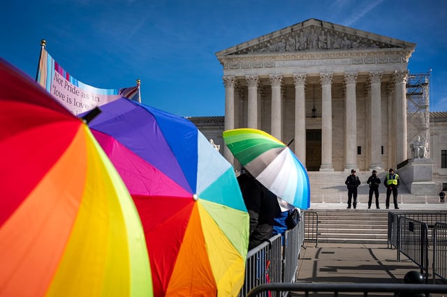 People with rainbow umbrellas protest in support of care for transgender youth outside the Supreme Court during the United States v. Skrmetti arguments regarding Tennessee blocking transgender care for minors on December 4, 2024.