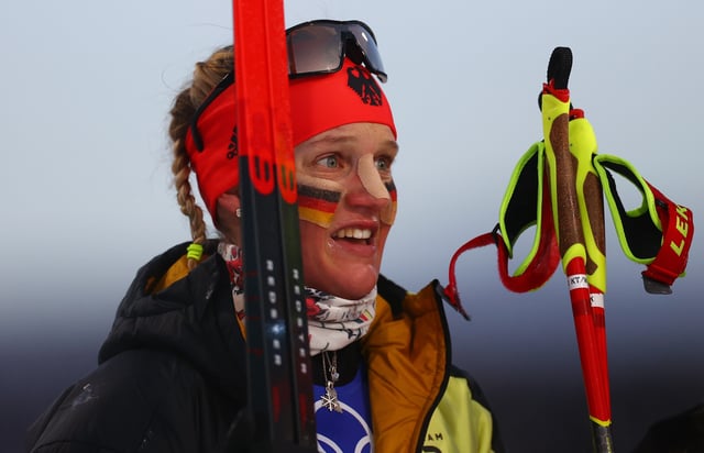 2022 Beijing Olympics - Cross-Country Skiing - Women's Team Sprint Classic Final - National Cross-Country Centre, Zhangjiakou, China - February 16, 2022.  Victoria Carl of Germany reacts after winning gold. REUTERS/Lindsey Wasson/File Photo