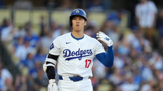 Los Angeles Dodgers designated hitter Shohei Ohtani (17) reacts in the seventh inning against the Kansas City Royals at Dodger Stadium on June 15, 2024.
