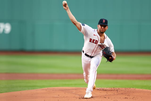 BOSTON, MASSACHUSETTS - JUNE 04: Starting pitcher Kutter Crawford #50 of the Boston Red Sox throws against the Atlanta Braves during the first inning at Fenway Park on June 04, 2024 in Boston, Massachusetts.