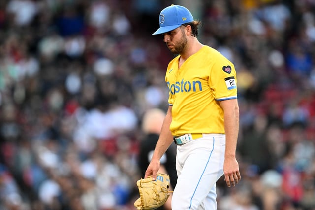 Sep 28, 2024; Boston, Massachusetts, USA; Boston Red Sox starting pitcher Kutter Crawford (50) walks of the field after being taken out of the game in the fifth inning against the Tampa Bay Rays at Fenway Park. Mandatory Credit: Brian Fluharty-Imagn Images/File Photo