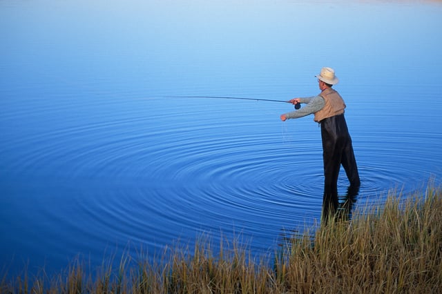 A man fly-fishes at Fish Lake on Steens Mountain in southeast Oregon.